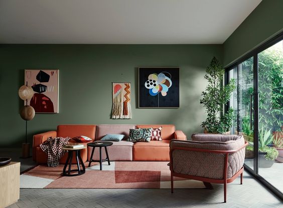 mẫu phòng khách sử dụng màu xanh lá cây kết hợp màu hồng