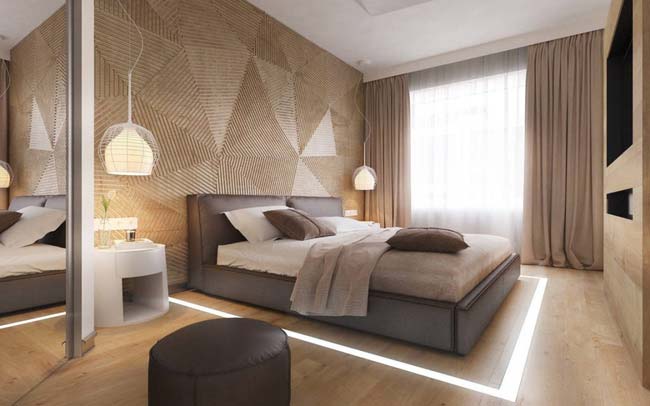 Bức tường đầu giường với những đường vân gỗ nổi thu hút ánh nhìn vô cùng.