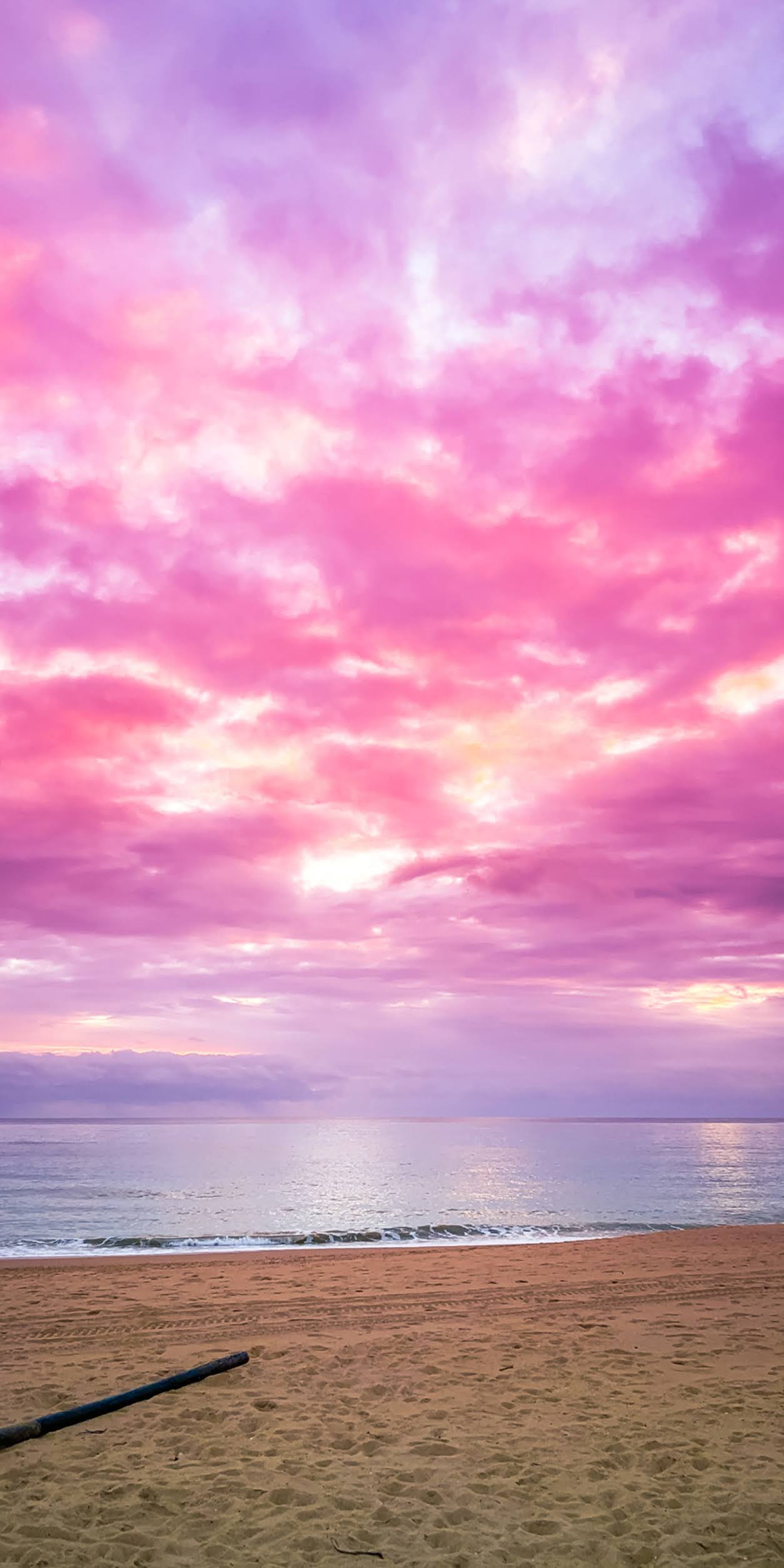 Hình nền bầu trời màu hồng trên biển